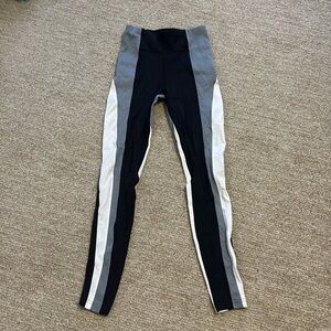 These are athleta black white and grey leggings. Barely worn
